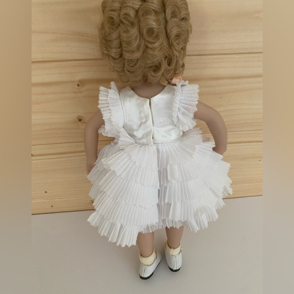 MBI Porcelain Shirley Temple 10” Doll “Baby Take a Bow” Ruffled White Dress - Picture 4 of 10